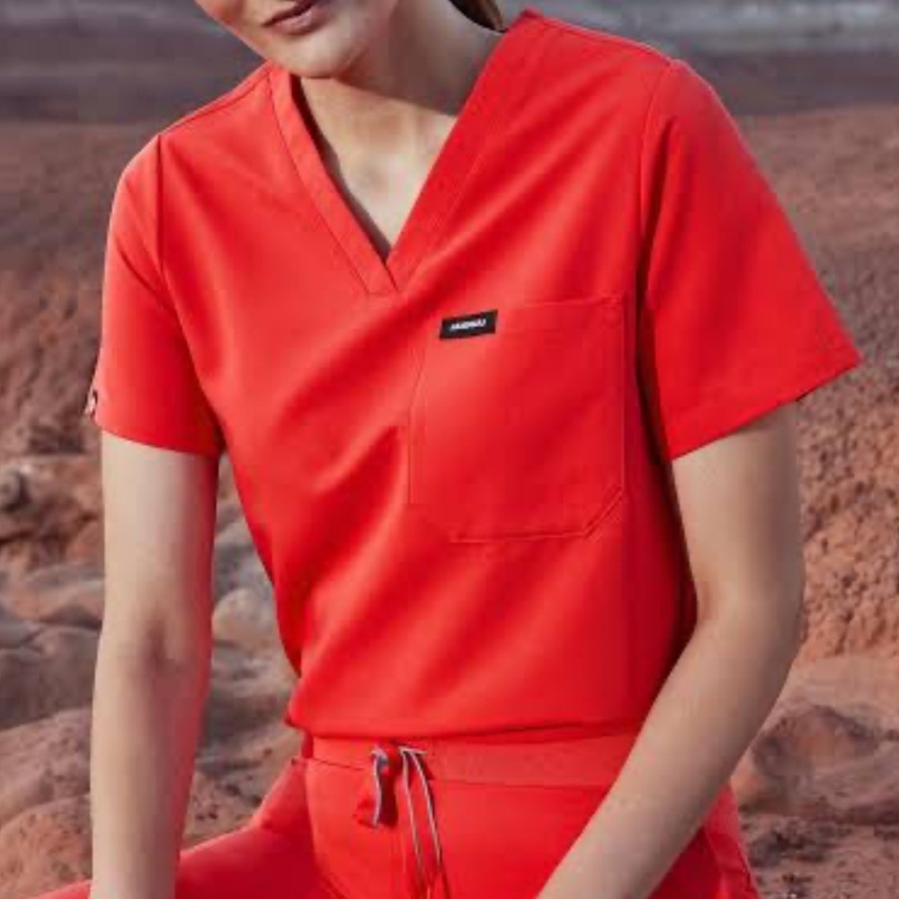 Like New - Jaanuu "Rhena" solar red 1-pocket scrub top (CLASSIC FIT)  - XS